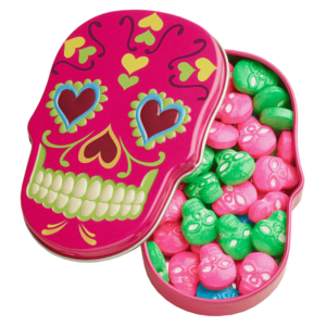 a tin of sugar skulls candy